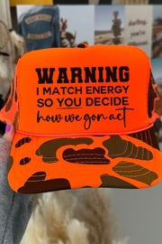 Warning I Match Energy Neon Orange Camo Trucker Hat